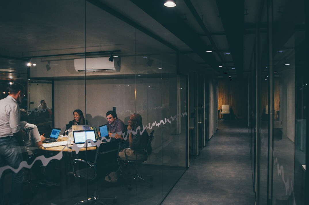 business team discussing software