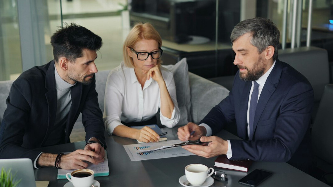 business team discussing software