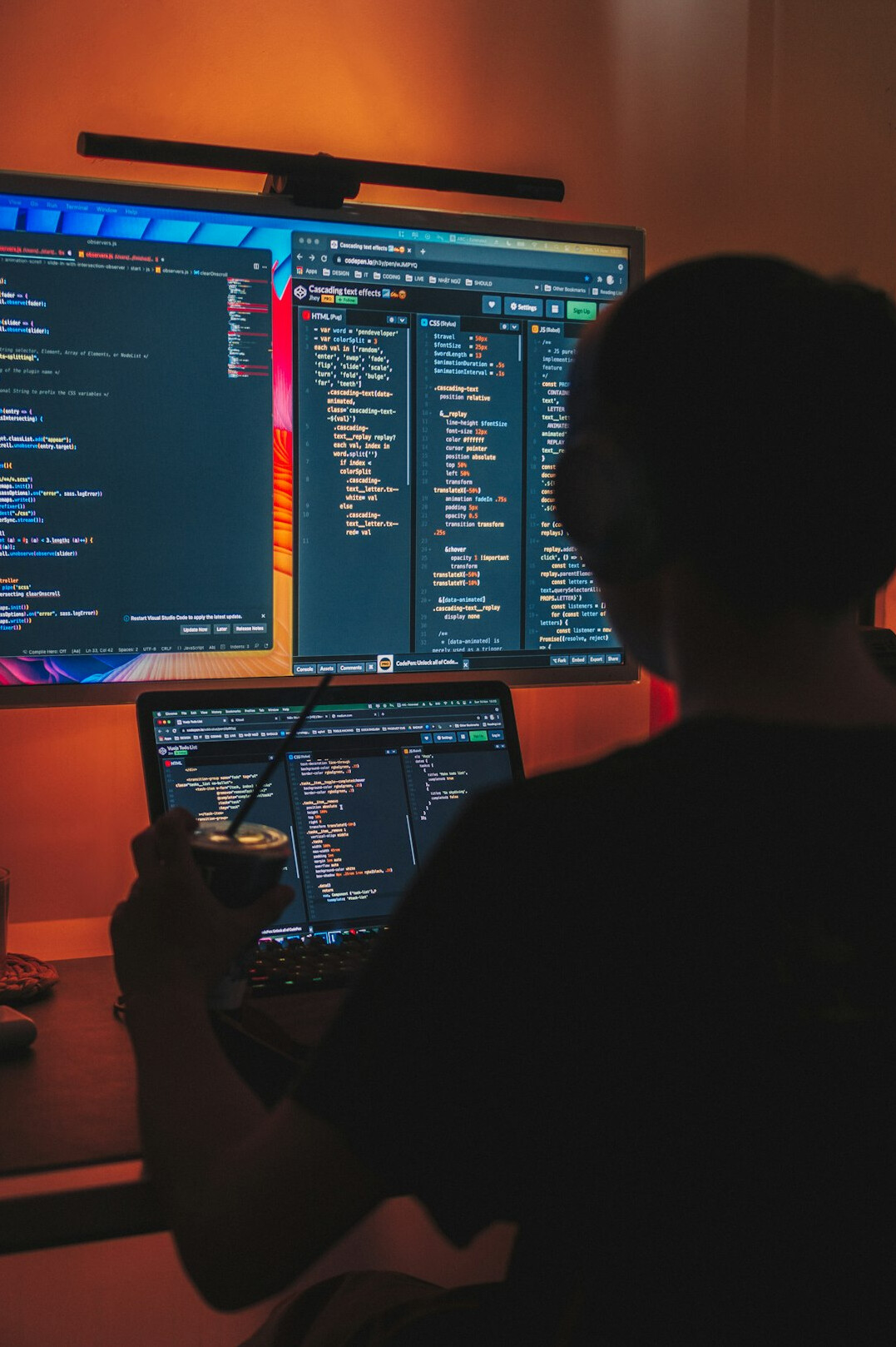 software developer coding at desk
